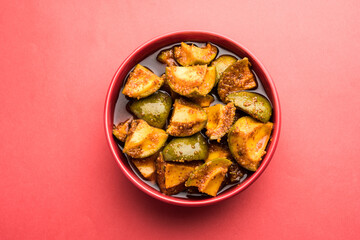 Indian Homemade Mango Pickle or Aam ka Achar in a bowl, selective focus
