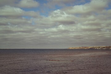 Landscape, storm clouds over the beach