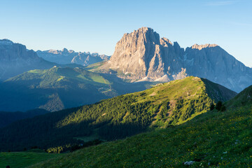 Fototapeta premium Amazing view from Seceda peak. Trentino Alto Adige, Dolomites Alps, South Tyrol, Italy, Europe. Picturesque panoramic view on Odle - Geisler mountain group, Seceda and Seiser Alm (Alpe di Siusi)