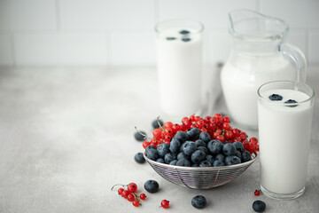fresh kefir in a glasses with berries