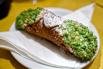 Italian sweet roll dessert “Cannoli Siciliani” nice detailed photo with pistachio