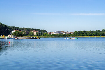 Fototapeta na wymiar Blue lake with sky reflection in the water