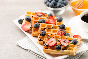 Photo of Belgian waffles. Dessert breakfast concept. 