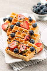 Photo of Belgian waffles. Dessert breakfast concept. 