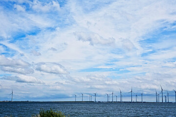Netherlands. Zeeland. Windmills and blue sky