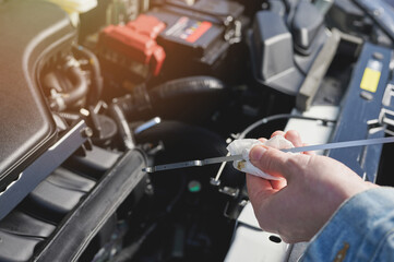 Checking oil level in car