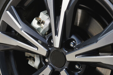 Shiny car wheel with alloy rims
