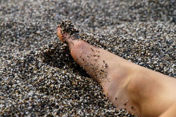 Stretching out the legs and feet at the beach