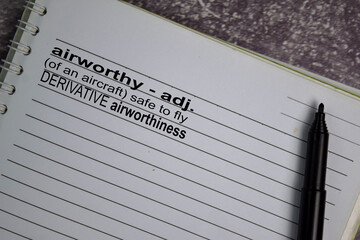 Definition of Airworthy word with a meaning on a book. dictionary concept