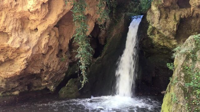 Small waterfall on the mountain. A waterfall near the town of Los Fayos (Zaragoza, Spain), called "Cascada de las Truchas" (waterfall of the trout)