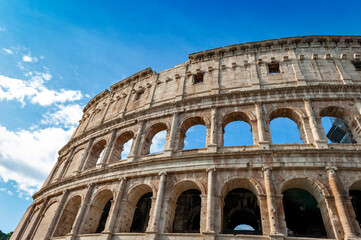 Naklejka premium Architectural details of the facade of the Colosseum (Coliseum) or Flavian Amphitheatre, the largest Roman amphitheater located in city of Rome, Italy