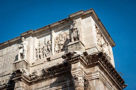 Close-up details of relief panels, round reliefs, and frieze on the attic of The Arch of Constantine, a triumphal arch in Rome, Italy