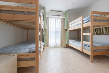 Bunk bed and mattress in guest house room - 365224992