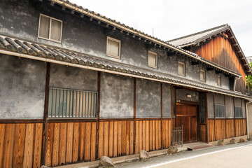 Fototapeta na wymiar Street view of an old and traditional sake brewery house in Ikeda city, Osaka, Japan