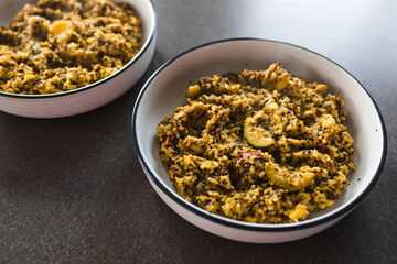 plant-based food, vegan pesto quinoa and rice with mediterranean vegetables