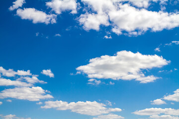 Obraz na płótnie Canvas Blue sky background with white clouds