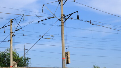 
Electric pole with wires in the countryside