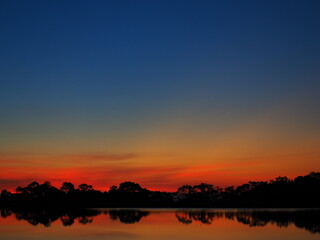 Peaceful lake at sunset with reflection in Australia