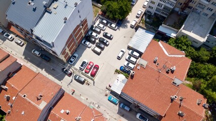 Aerial view of outdoor parking space between buildings