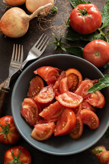 Ready to eat salad with fresh garden tomatoes, homemade food in country style
