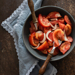Ready to eat salad with fresh garden tomatoes, homemade food in country style