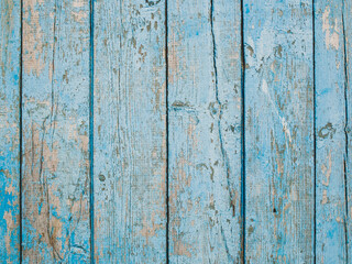 Fototapeta na wymiar Old light blue weathered wood planks. Abstract background