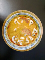 Bowls of Asian soup noodles and vegetables
