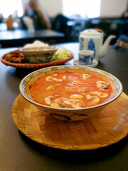Bowls of Asian soup noodles and vegetables