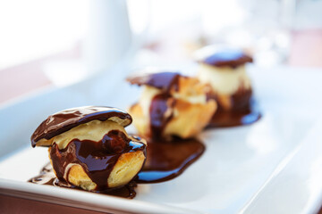 French Profiteroles with chocolate sauce
