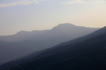 Fototapeta na wymiar Silhouettes of the Crimean mountains in the evening light