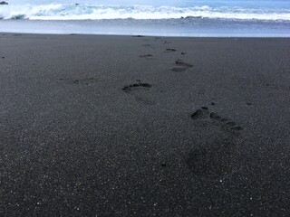 Asian country Indonesia. Bali island. Nusa penida, black sand beach and ocean
