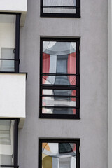 Fototapeta premium Facade of a building with glittering windows. 