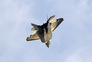 F-22 Raptor stealth fighter making a sharp turn