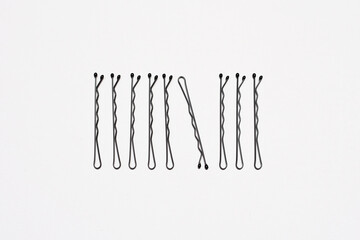 Bobby pins on a white background