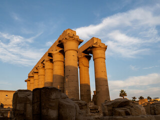 special light at luxor temple with columns of the ancient temple