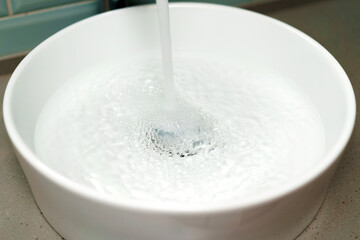 Modern bathroom interior with white ceramic sink