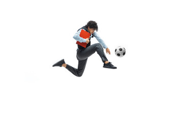 Fototapeta na wymiar Man in office clothes playing football or soccer with ball on white background like professional player. Unusual look for businessman in jump kicking ball. Sport, healthy lifestyle, creativity.
