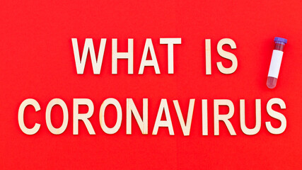 Сoronavirus outbreak. Text in wooden letters on a red background