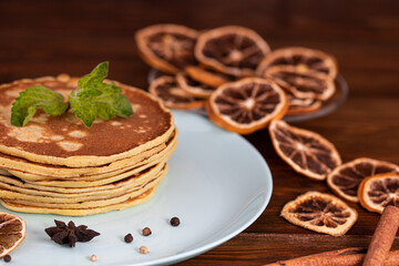  Homemade pancakes with spices, cinnamon and dried orange
