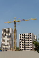 tower crane on the construction of high-rise buildings. concept for the construction of real estate.