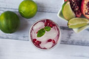 Pomegranate cocktail. Summer light alcoholic drink.