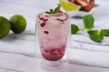 Pomegranate cocktail. Summer light alcoholic drink.