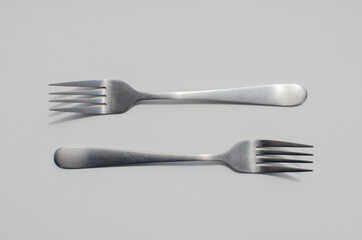 fork and spoon on white background