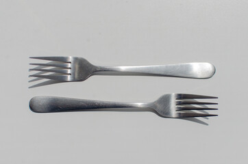 fork and spoon on white background