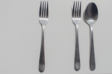 fork and spoon on white background