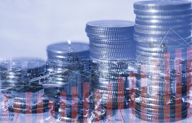 double exposure of city with row of coin stack with growth chart and graph progress report for business investment finance banking and money saving concept.