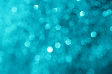 Fototapeta na wymiar glitter light sparkle blue gorgeous bokeh defocused abstract background shiny.