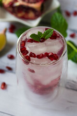 Pomegranate cocktail. Summer light alcoholic drink.