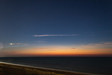 sunset over the sea, skyline, starry sky