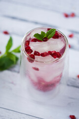 Pomegranate cocktail. Summer light alcoholic drink.